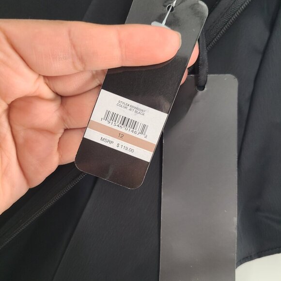 Bebe Shorts Romper Womens Size 12 One piece Short Sleeve V-Neck Ruffle Black NWT - Picture 7 of 9